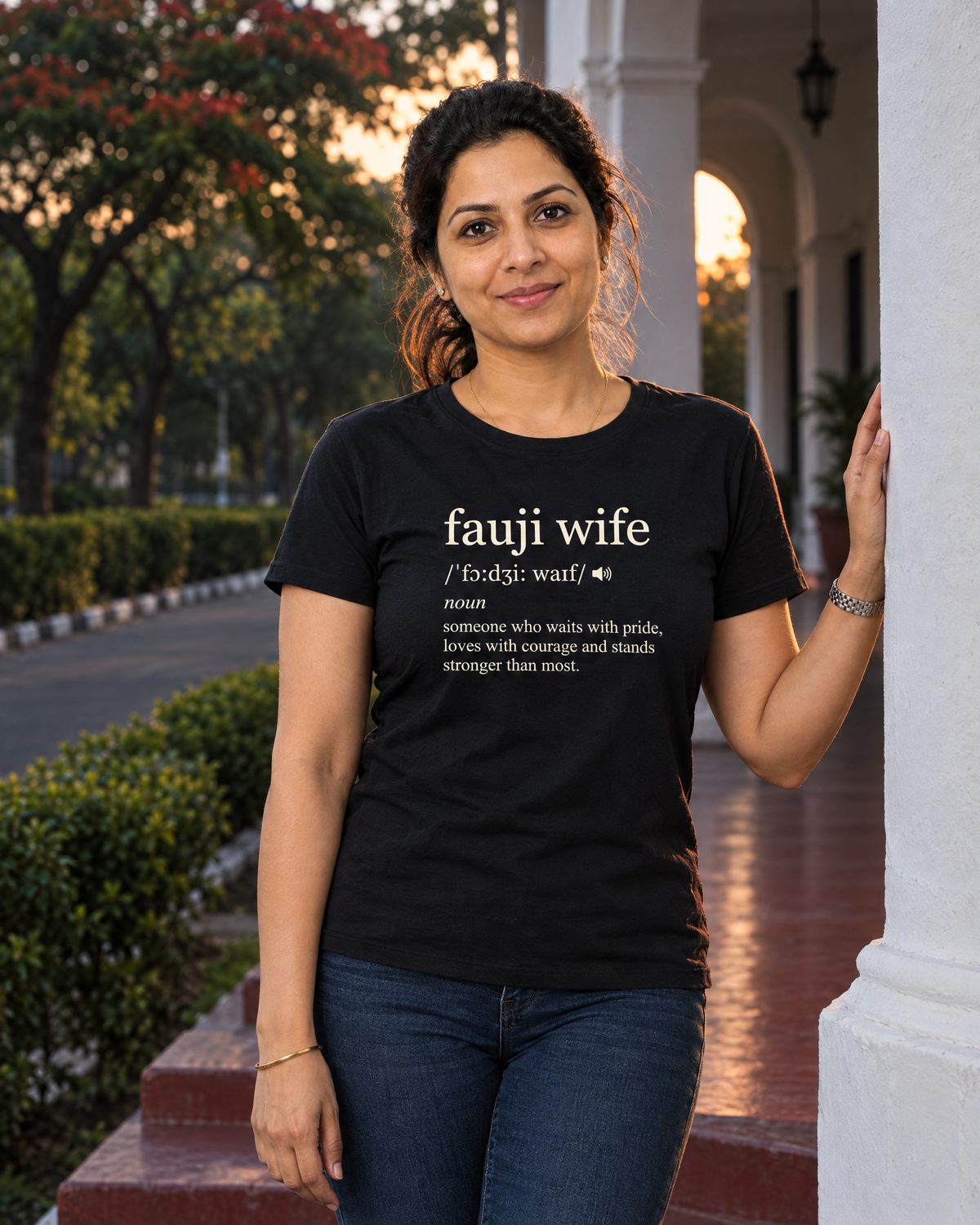 Woman in the Fauji Wife Dictionary tee on a cantonment verandah at dusk